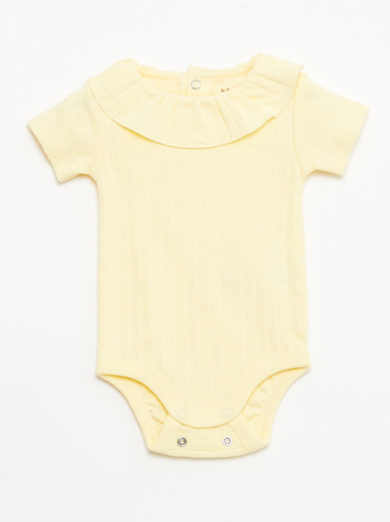 Conjunto body evolutivo + pijama em malha canelada Amarelo - Kiabi