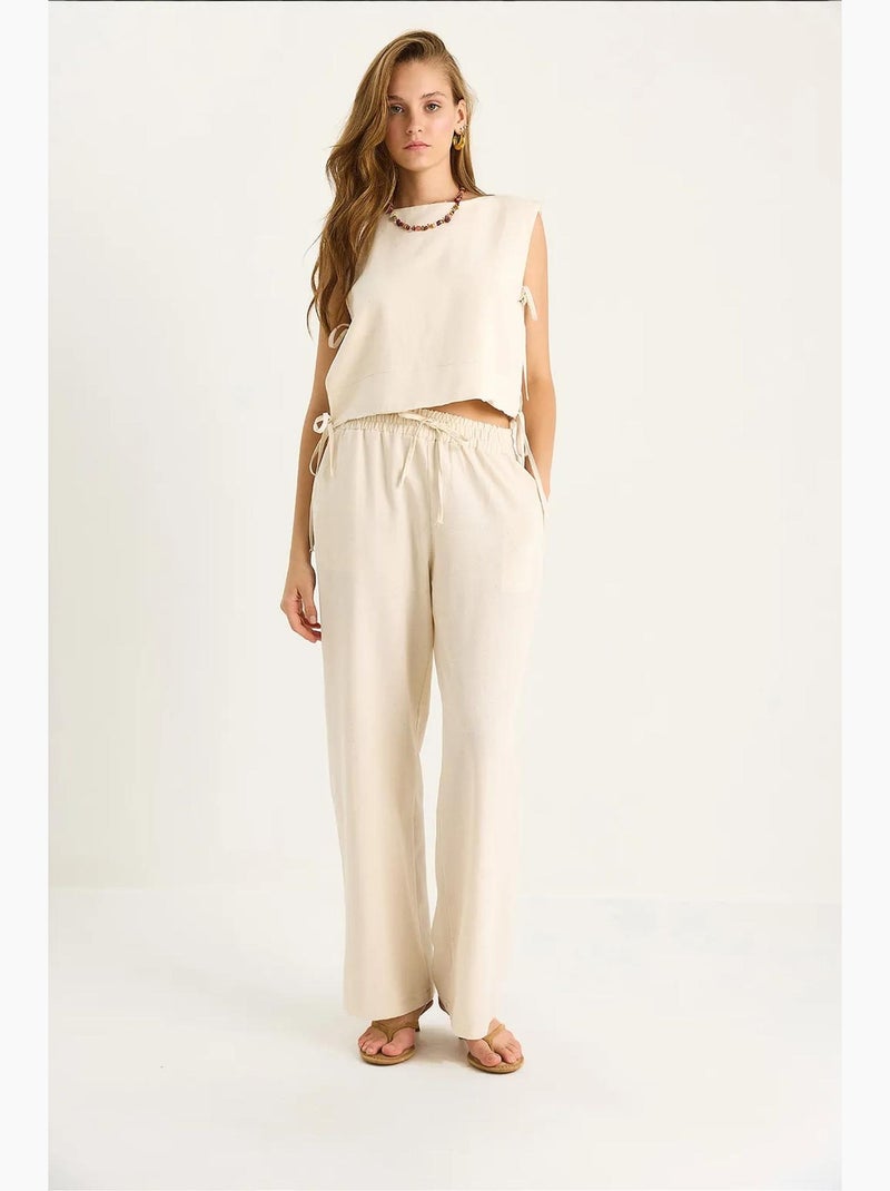 Conjunto co-ord de duas peças com gola redonda, fecho de atar e calças de perna larga lucci Bege-argila - Kiabi