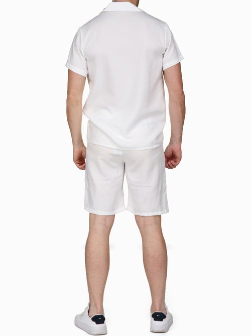 Conjunto composto por camisa e calções lisos com textura - Frilivin - Kiabi Conjunto composto por camisa e calções lisos com textura - Frilivin - Kiabi