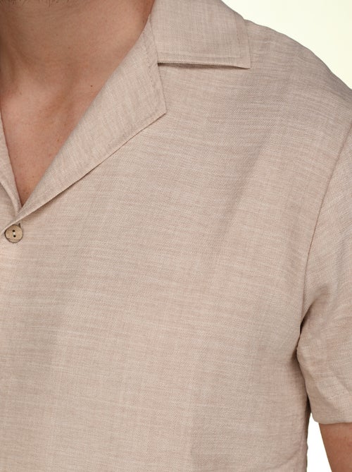 Conjunto composto por camisa e calções lisos com textura - Frilivin - Kiabi Conjunto composto por camisa e calções lisos com textura - Frilivin - Kiabi