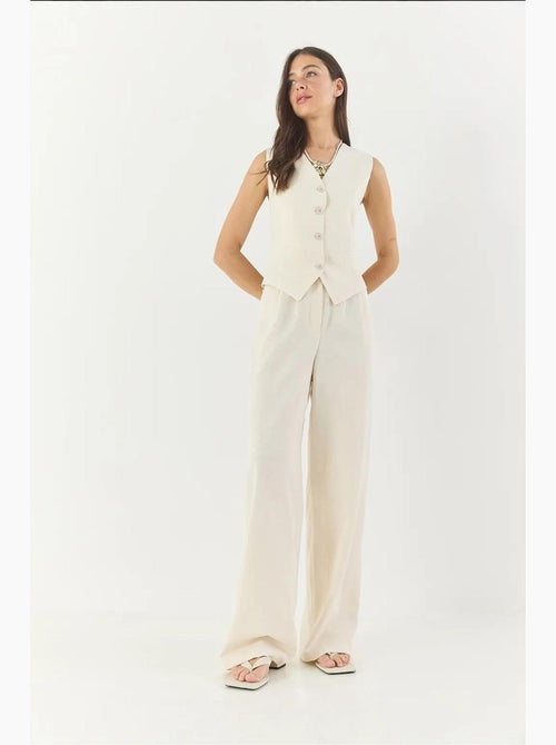 Conjunto coord de duas peças com colete de decote em v e calças de perna larga lucci - Kiabi Conjunto coord de duas peças com colete de decote em v e calças de perna larga lucci - Kiabi