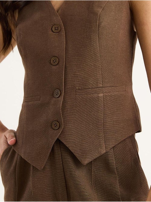 Conjunto coord de duas peças com colete de decote em v e calças de perna larga lucci - Kiabi Conjunto coord de duas peças com colete de decote em v e calças de perna larga lucci - Kiabi