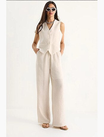Conjunto coord de duas peças com colete de decote em v e calças de perna larga lucci