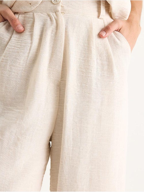 Conjunto coord de duas peças com colete de decote em v e calças de perna larga lucci - Kiabi Conjunto coord de duas peças com colete de decote em v e calças de perna larga lucci - Kiabi