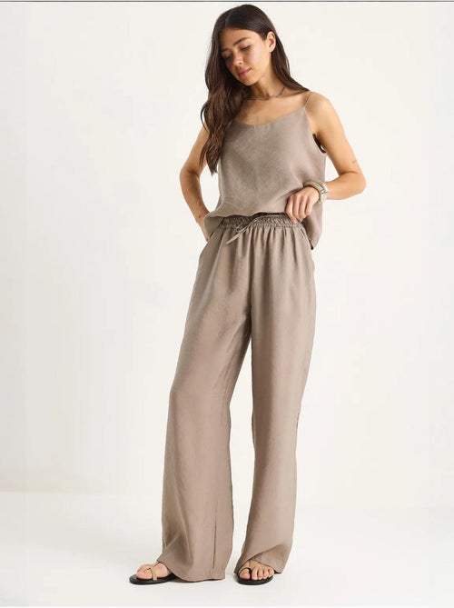 Conjunto coordenado com camisola sem mangas e calças de perna larga lucci - Kiabi Conjunto coordenado com camisola sem mangas e calças de perna larga lucci - Kiabi