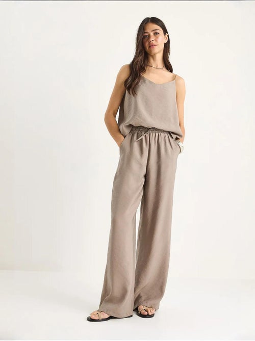 Conjunto coordenado com camisola sem mangas e calças de perna larga lucci - Kiabi Conjunto coordenado com camisola sem mangas e calças de perna larga lucci - Kiabi