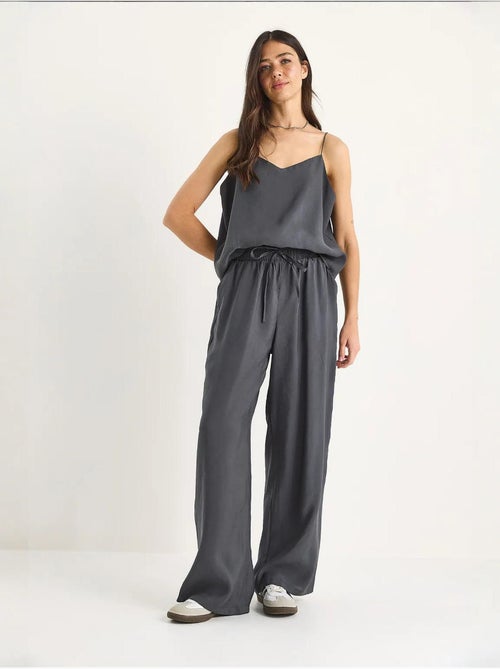 Conjunto coordenado com camisola sem mangas e calças de perna larga lucci - Kiabi Conjunto coordenado com camisola sem mangas e calças de perna larga lucci - Kiabi