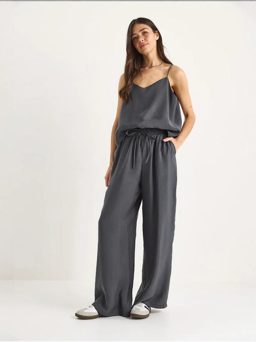 Conjunto coordenado com camisola sem mangas e calças de perna larga lucci - Kiabi Conjunto coordenado com camisola sem mangas e calças de perna larga lucci - Kiabi