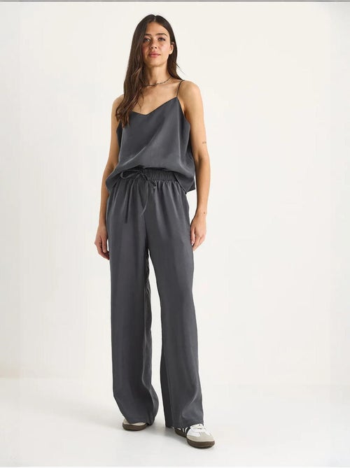 Conjunto coordenado com camisola sem mangas e calças de perna larga lucci - Kiabi Conjunto coordenado com camisola sem mangas e calças de perna larga lucci - Kiabi
