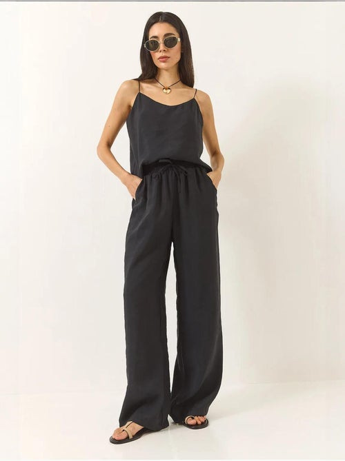 Conjunto coordenado com camisola sem mangas e calças de perna larga lucci - Kiabi Conjunto coordenado com camisola sem mangas e calças de perna larga lucci - Kiabi