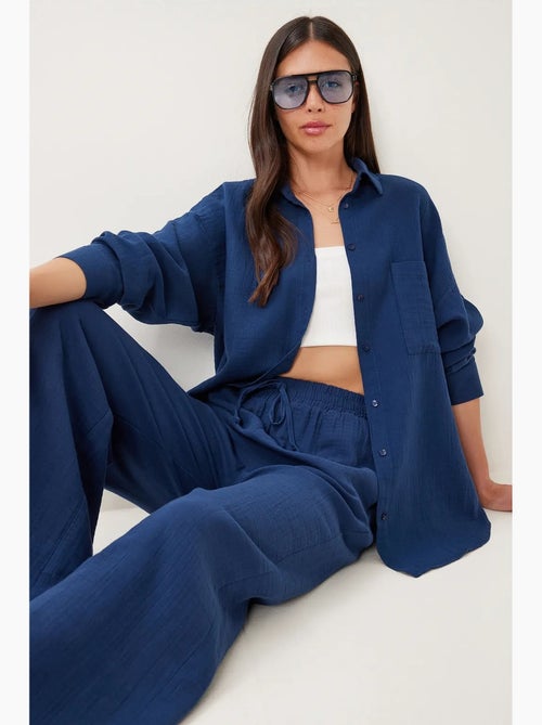 Conjunto coordenado de duas peças de cintura subida com perna larga e gola de camisa istanbul - Kiabi Conjunto coordenado de duas peças de cintura subida com perna larga e gola de camisa istanbul - Kiabi