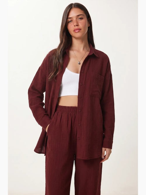 Conjunto coordenado de duas peças de cintura subida com perna larga e gola de camisa istanbul - Kiabi Conjunto coordenado de duas peças de cintura subida com perna larga e gola de camisa istanbul - Kiabi