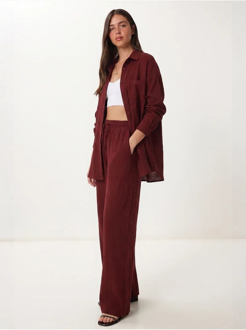 Conjunto coordenado de duas peças de cintura subida com perna larga e gola de camisa istanbul - Kiabi Conjunto coordenado de duas peças de cintura subida com perna larga e gola de camisa istanbul - Kiabi