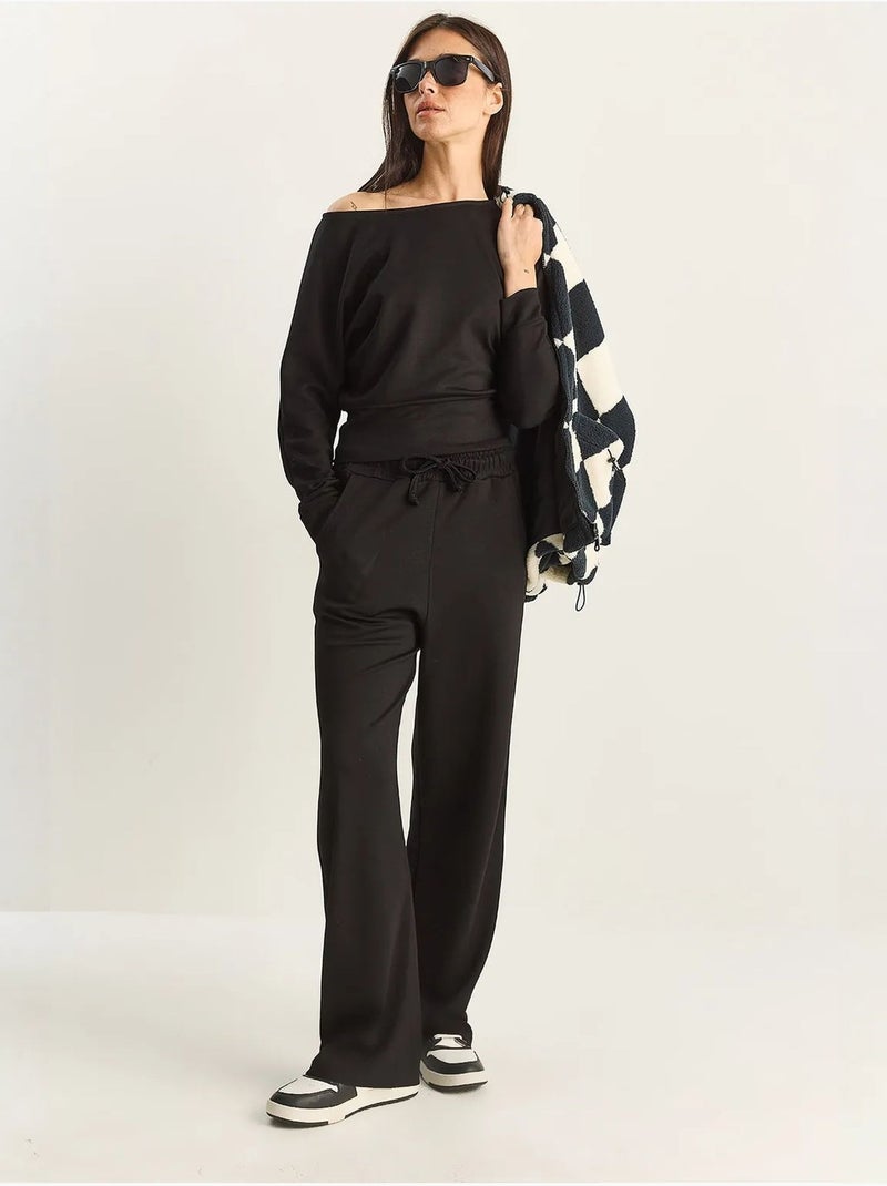 Conjunto coordenado de duas peças em malha com gola assimétrica e cintura subida lucci Preto - Kiabi