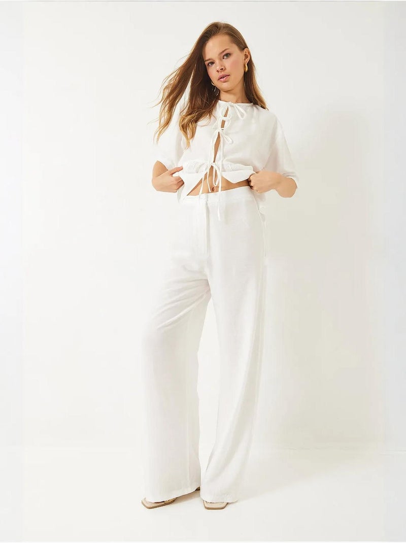 Conjunto coordenado de duas peças texturizado com detalhe de folhos lucci Branco - Kiabi