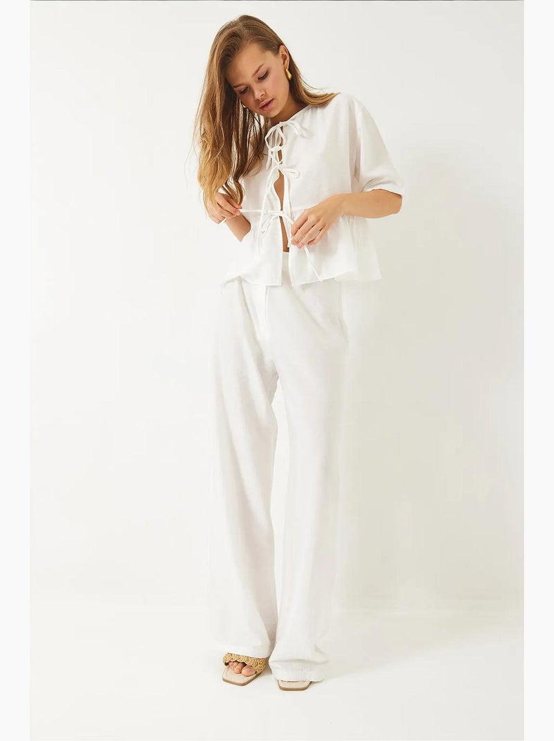 Conjunto coordenado de duas peças texturizado com detalhe de folhos lucci Branco - Kiabi