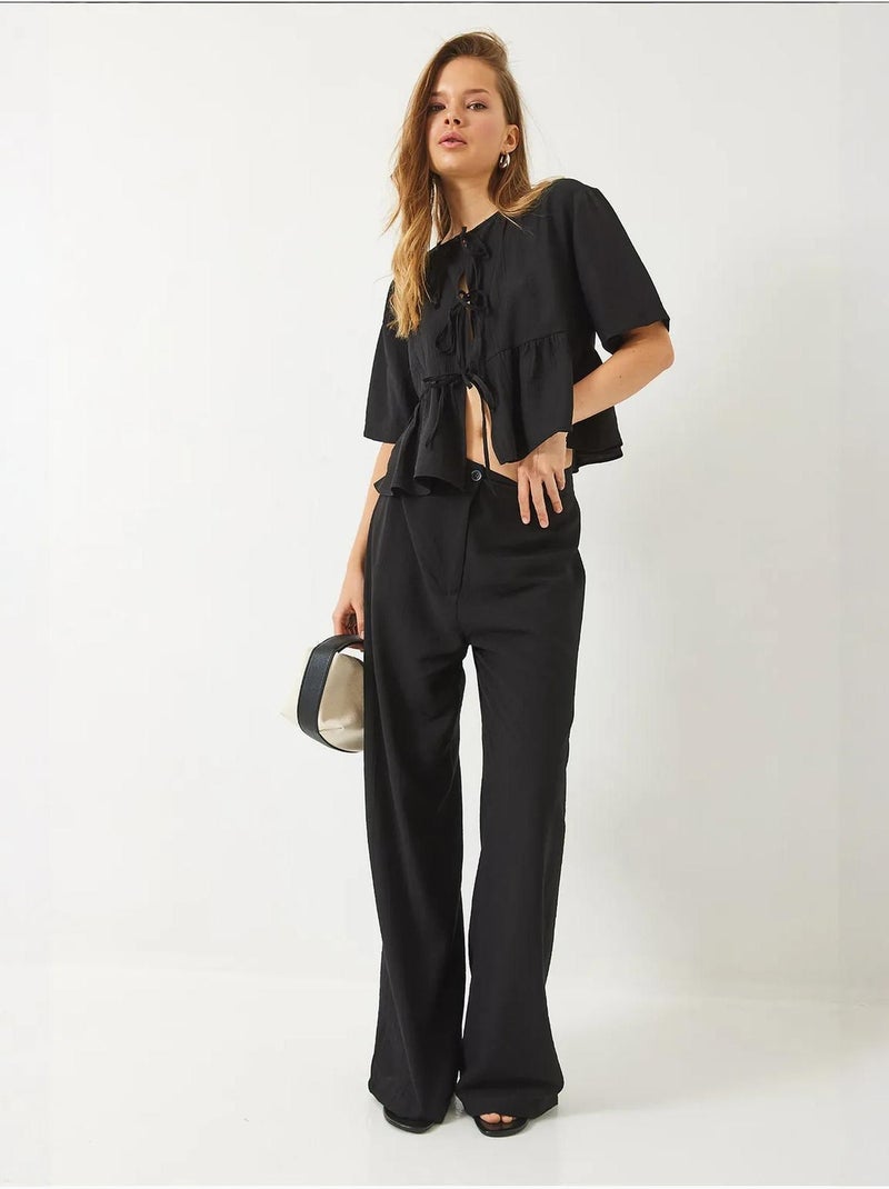 Conjunto coordenado de duas peças texturizado com detalhe de folhos lucci Preto - Kiabi