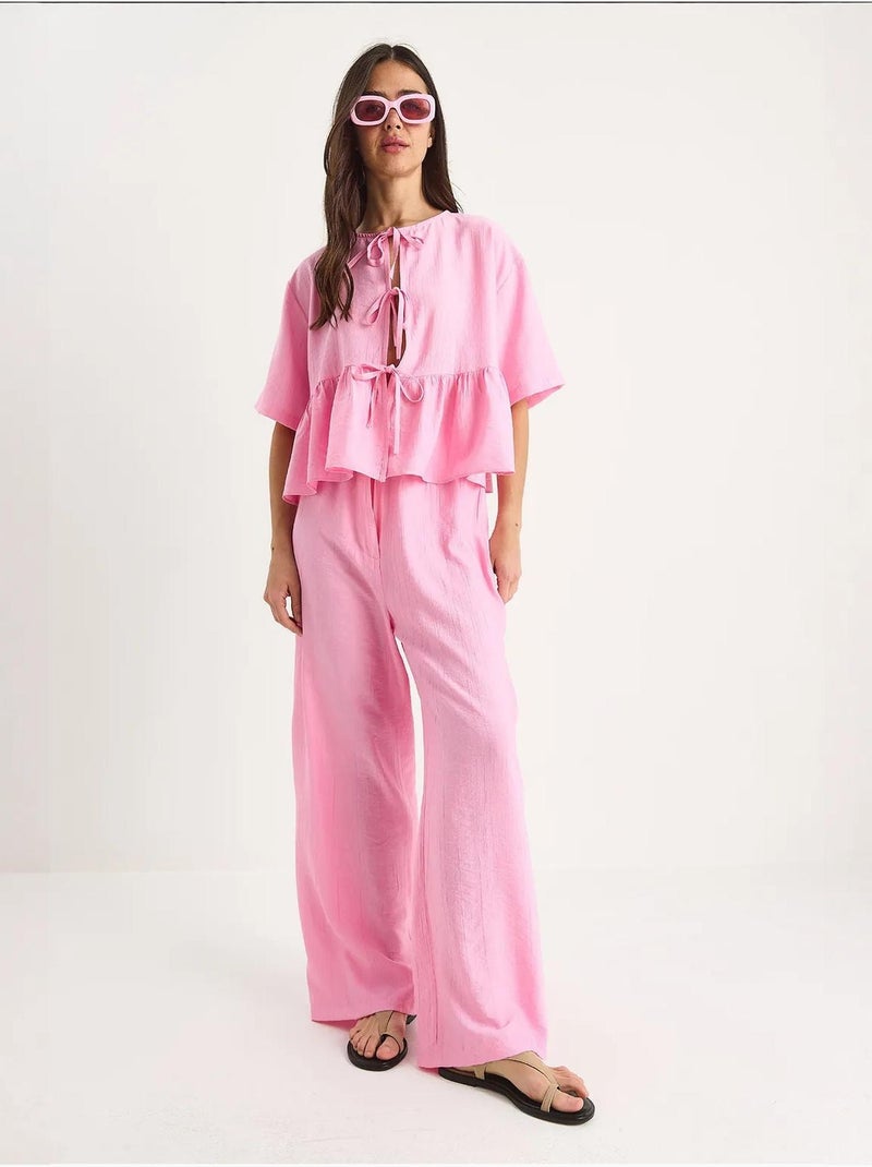 Conjunto coordenado de duas peças texturizado com detalhe de folhos lucci Rosa-claro - Kiabi