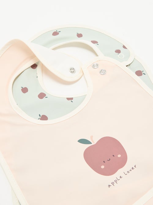 Conjunto de 2 babetes impermeáveis com estampado - Kiabi Conjunto de 2 babetes impermeáveis com estampado - Kiabi