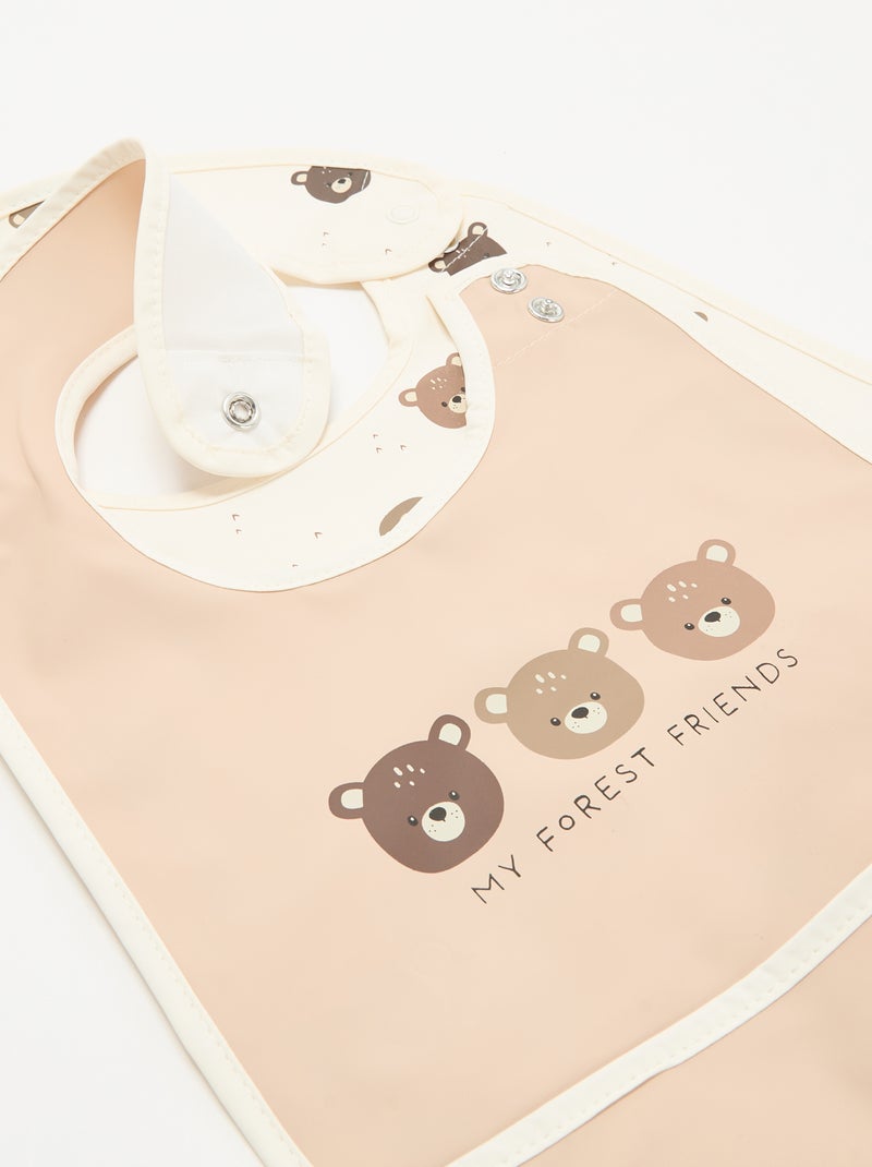 Conjunto de 2 babetes impermeáveis com estampado Bege - Kiabi