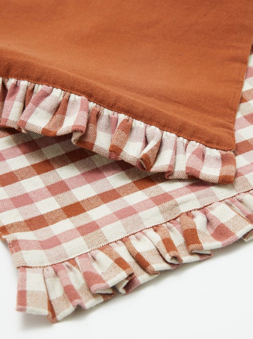 Conjunto de 2 individuais de mesa (32x45 cm) com folhos - Kiabi Conjunto de 2 individuais de mesa (32x45 cm) com folhos - Kiabi