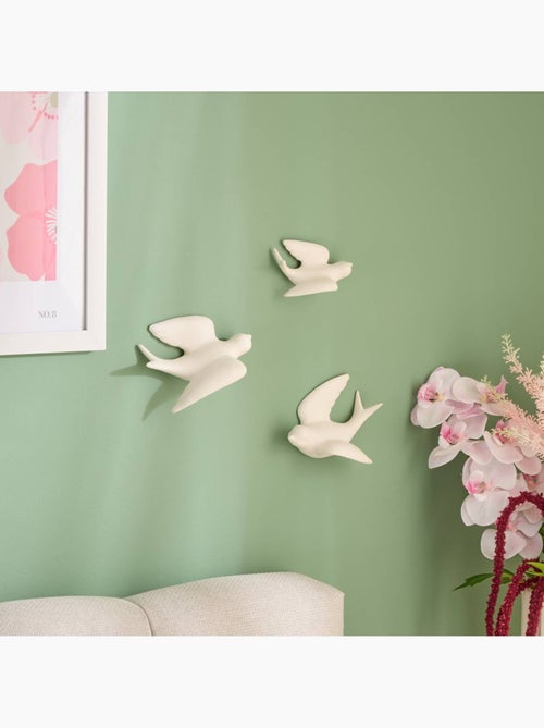 Conjunto de 3 pássaros em dolomita para decoração de parede - Kiabi Conjunto de 3 pássaros em dolomita para decoração de parede - Kiabi
