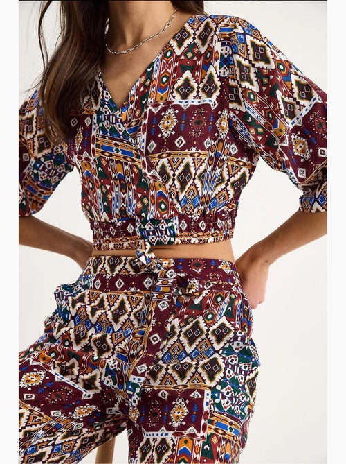 Conjunto de blusa e calças cropped estampadas lucci - Kiabi Conjunto de blusa e calças cropped estampadas lucci - Kiabi