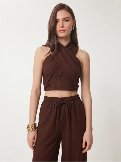 Conjunto de blusa halter e calças de perna larga istanbul - Kiabi Conjunto de blusa halter e calças de perna larga istanbul - Kiabi