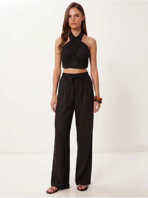 Conjunto de blusa halter e calças de perna larga istanbul - Kiabi Conjunto de blusa halter e calças de perna larga istanbul - Kiabi