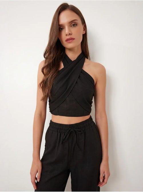 Conjunto de blusa halter e calças de perna larga istanbul - Kiabi Conjunto de blusa halter e calças de perna larga istanbul - Kiabi
