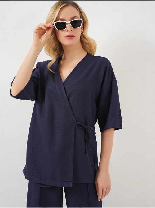 Conjunto de calças kimono oversized com decote em v e fecho de atar bdart - Kiabi Conjunto de calças kimono oversized com decote em v e fecho de atar bdart - Kiabi