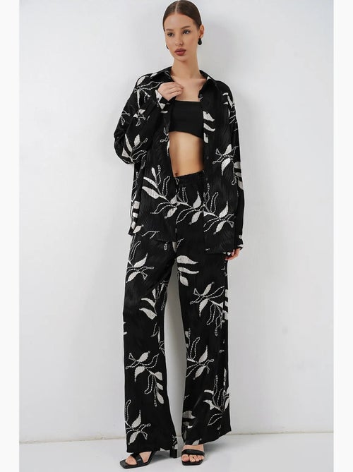 Conjunto de camisa floral em viscose e calças de perna larga bdart - Kiabi Conjunto de camisa floral em viscose e calças de perna larga bdart - Kiabi