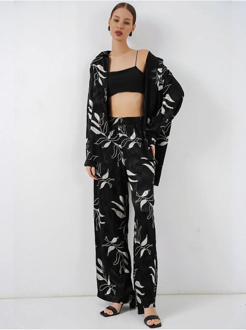 Conjunto de camisa floral em viscose e calças de perna larga bdart - Kiabi Conjunto de camisa floral em viscose e calças de perna larga bdart - Kiabi