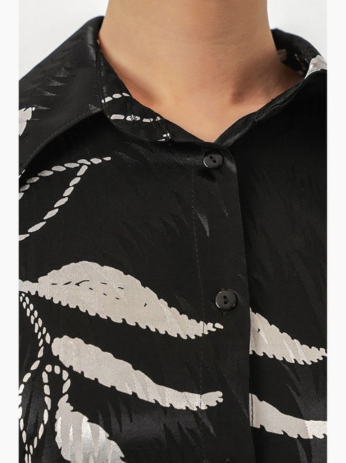 Conjunto de camisa floral em viscose e calças de perna larga bdart - Kiabi Conjunto de camisa floral em viscose e calças de perna larga bdart - Kiabi