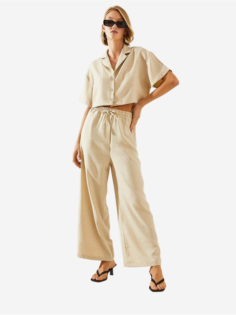 Conjunto de duas peças com blusa cropped e calças abotoadas e bolsos lucci Bege-argila - Kiabi