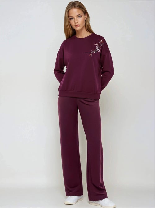 Conjunto de duas peças com sweatshirt de gola redonda bordada e calças de perna reta hiccup - Kiabi Conjunto de duas peças com sweatshirt de gola redonda bordada e calças de perna reta hiccup - Kiabi