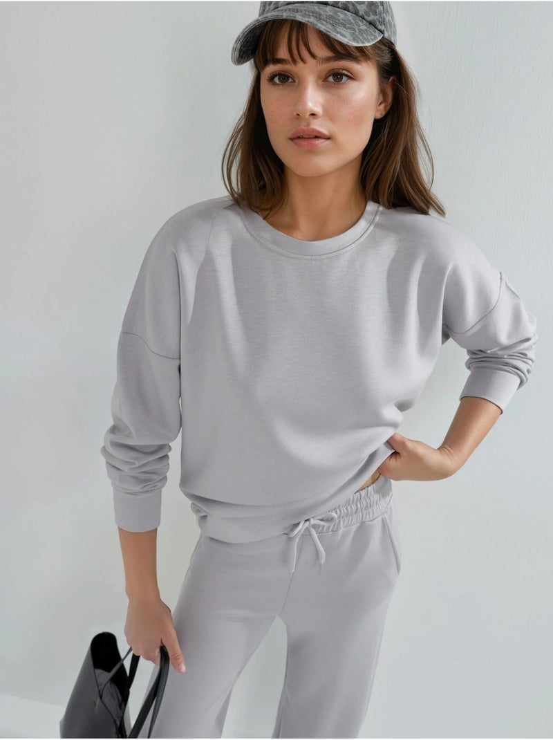 Conjunto de duas peças com sweatshirt de gola redonda modal touch e calças de perna larga hiccup Cinza claro - Kiabi