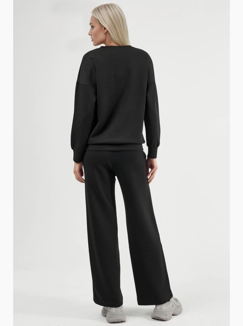 Conjunto de duas peças com sweatshirt de gola redonda modal touch e calças de perna larga hiccup Preto - Kiabi