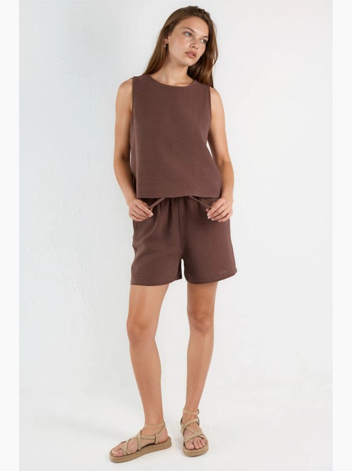 Conjunto de duas peças com top de musselina sem mangas e calções hiccup - Kiabi Conjunto de duas peças com top de musselina sem mangas e calções hiccup - Kiabi