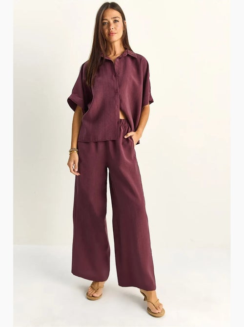 Conjunto de duas peças de perna larga de cintura subida com colarinho de camisa lucci - Kiabi Conjunto de duas peças de perna larga de cintura subida com colarinho de camisa lucci - Kiabi