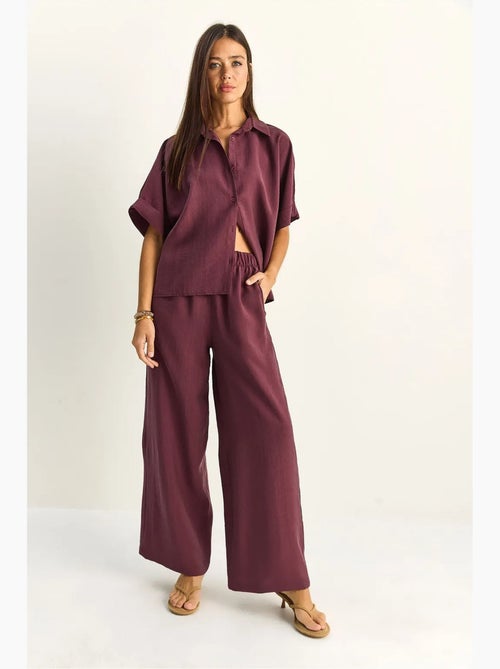 Conjunto de duas peças de perna larga de cintura subida com colarinho de camisa lucci - Kiabi Conjunto de duas peças de perna larga de cintura subida com colarinho de camisa lucci - Kiabi