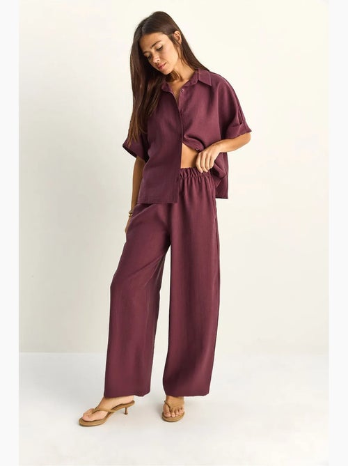 Conjunto de duas peças de perna larga de cintura subida com colarinho de camisa lucci - Kiabi Conjunto de duas peças de perna larga de cintura subida com colarinho de camisa lucci - Kiabi