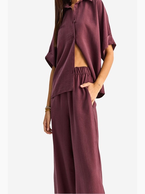 Conjunto de duas peças de perna larga de cintura subida com colarinho de camisa lucci - Kiabi Conjunto de duas peças de perna larga de cintura subida com colarinho de camisa lucci - Kiabi