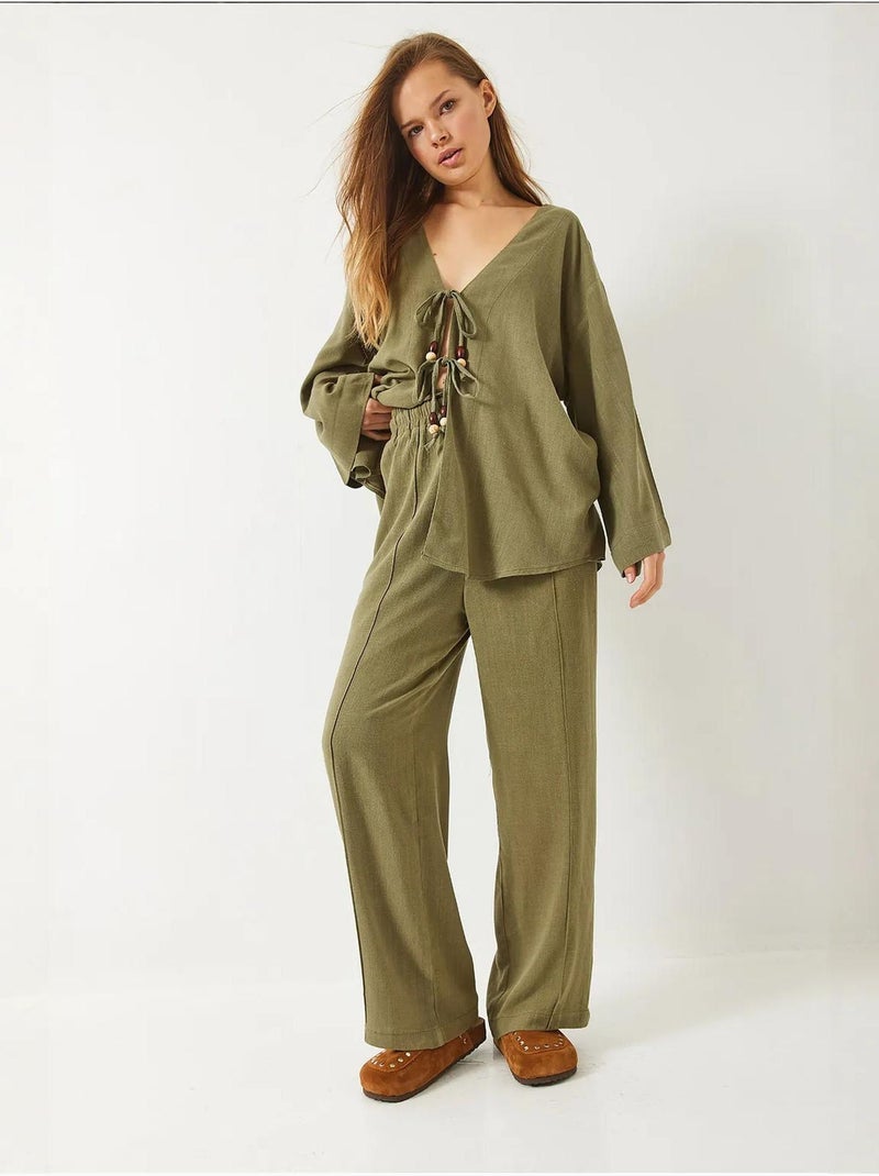 Conjunto de duas peças em linho com detalhe de missangas e laço frontal lucci Verde - Kiabi