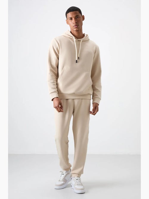 Conjunto de homem de sweatshirt com capuz e calças tommy - Kiabi Conjunto de homem de sweatshirt com capuz e calças tommy - Kiabi