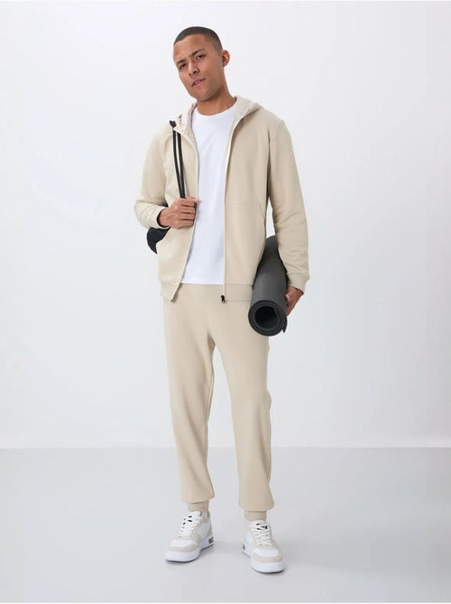 Conjunto de homem de sweatshirt com capuz e calças tommy - Kiabi Conjunto de homem de sweatshirt com capuz e calças tommy - Kiabi