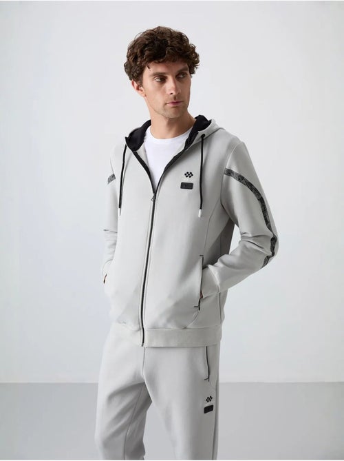 Conjunto de homem de sweatshirt com capuz e calças tommy - Kiabi Conjunto de homem de sweatshirt com capuz e calças tommy - Kiabi