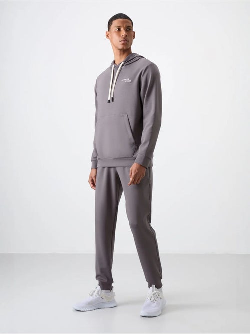 Conjunto de homem de sweatshirt com capuz e calças tommy - Kiabi Conjunto de homem de sweatshirt com capuz e calças tommy - Kiabi