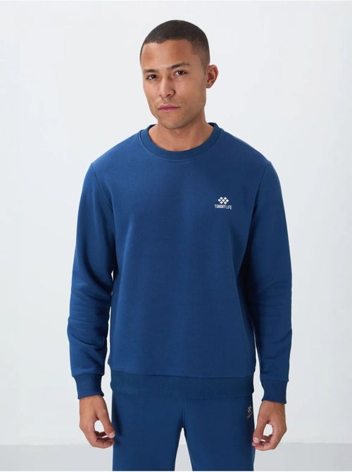 Conjunto de homem de sweatshirt e calças em felpa de algodão e poliéster tommy - Kiabi Conjunto de homem de sweatshirt e calças em felpa de algodão e poliéster tommy - Kiabi