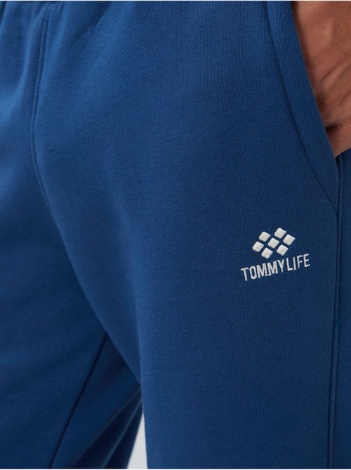 Conjunto de homem de sweatshirt e calças em felpa de algodão e poliéster tommy - Kiabi Conjunto de homem de sweatshirt e calças em felpa de algodão e poliéster tommy - Kiabi